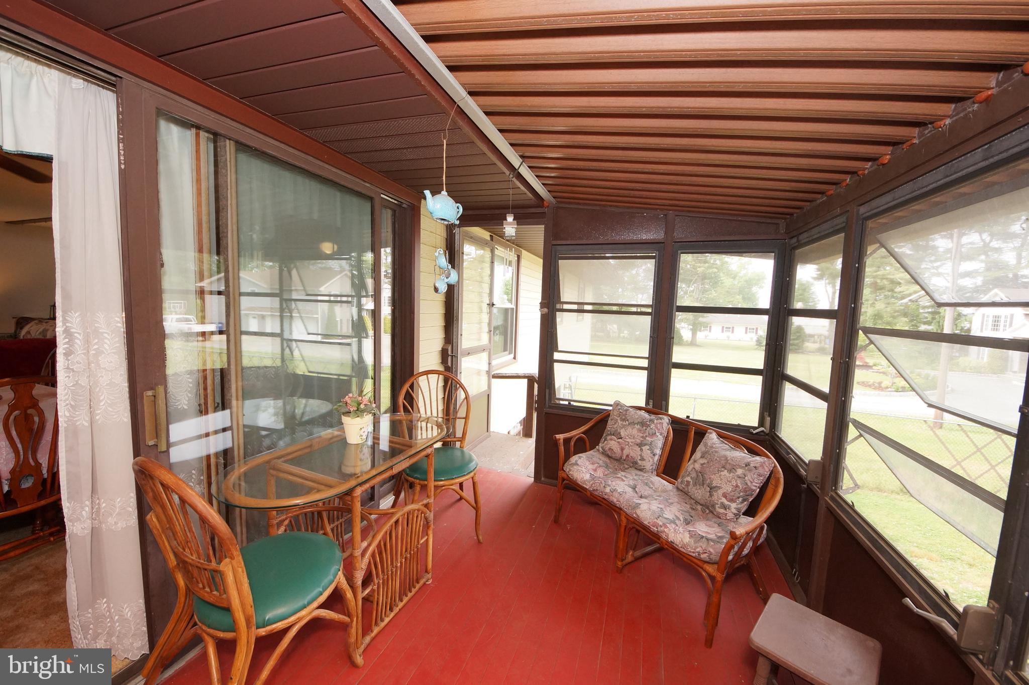 143 Petticoat Bridge Road Columbus, NJ 08022 - Photo 37 of 47 Enclosed sunporch from dining room