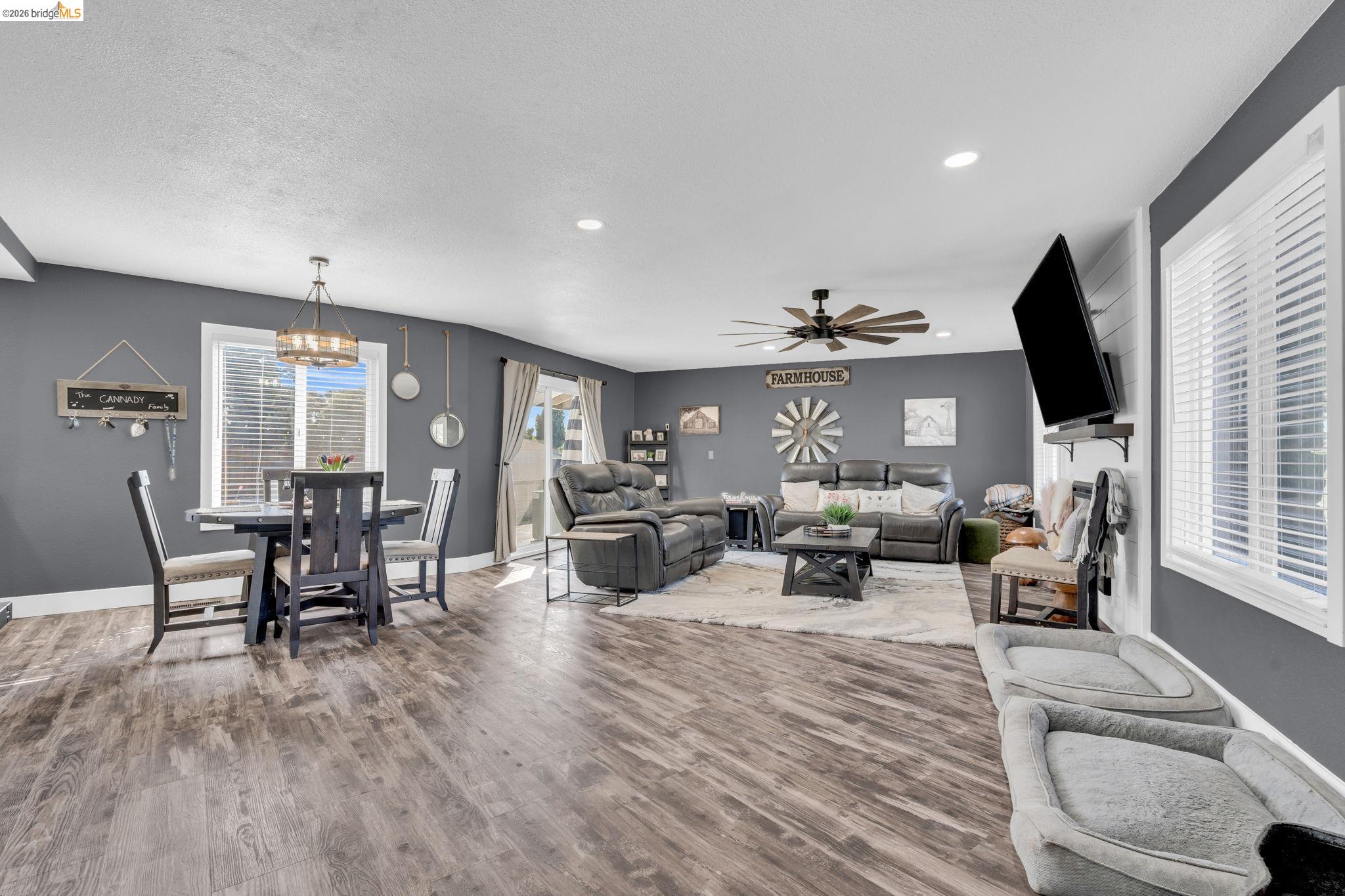 59 Old Stagecoach Road Brentwood, CA 94513 - Photo 14 of 70 Open-concept interior featuring wood-finish flooring, recessed lighting, and a modern ceiling fan