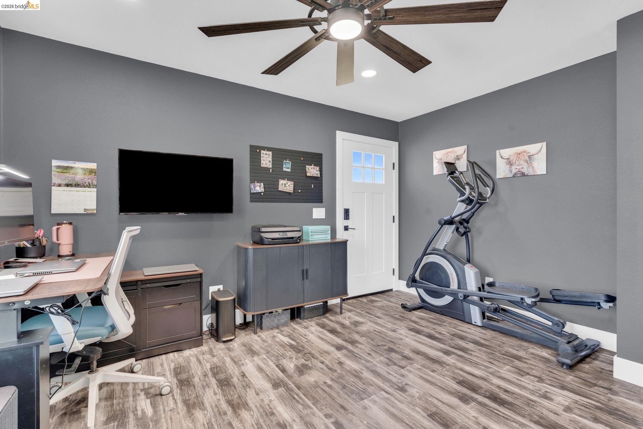 59 Old Stagecoach Road Brentwood, CA 94513 - Photo 33 of 70 Versatile room featuring wood-finish flooring and a ceiling fan with integrated lighting