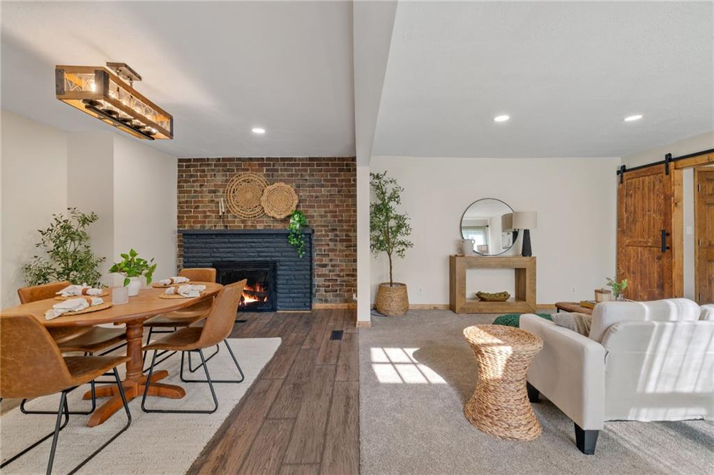 4305 Matthews Road Edinburg, PA 16116 - Photo 7 of 33 a living room with furniture and a fireplace
