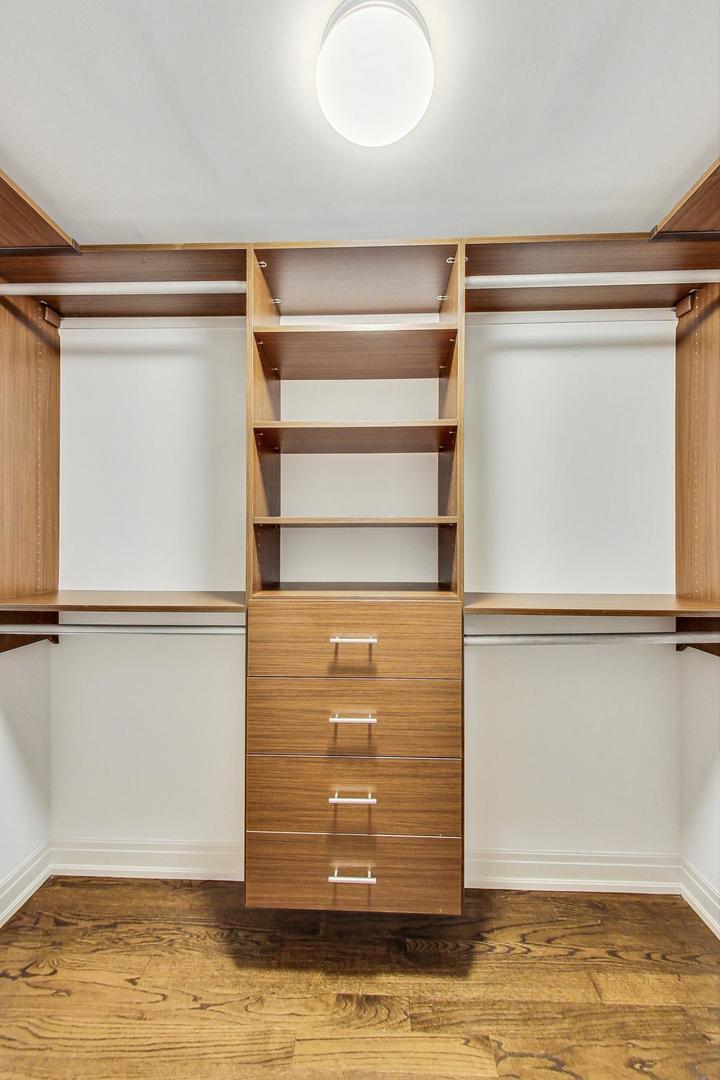 2848 North Sheffield Avenue, Unit 1N Chicago, IL 60657 - Photo 23 of 40 a view of walk in closet with empty racks