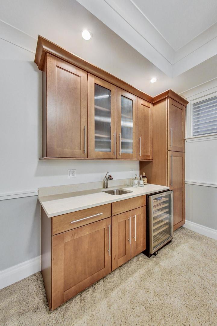 2848 North Sheffield Avenue, Unit 1N Chicago, IL 60657 - Photo 33 of 40 a kitchen with a sink and cabinets