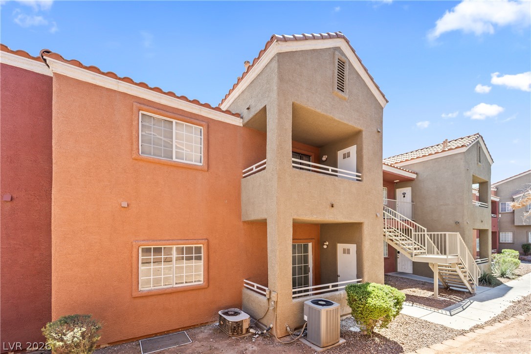 4730 East Craig Road, Unit 1053 Las Vegas, NV 89115 - Photo 24 of 32 Multi-level living spaces offer private balconies, connecting residents to the outdoors.