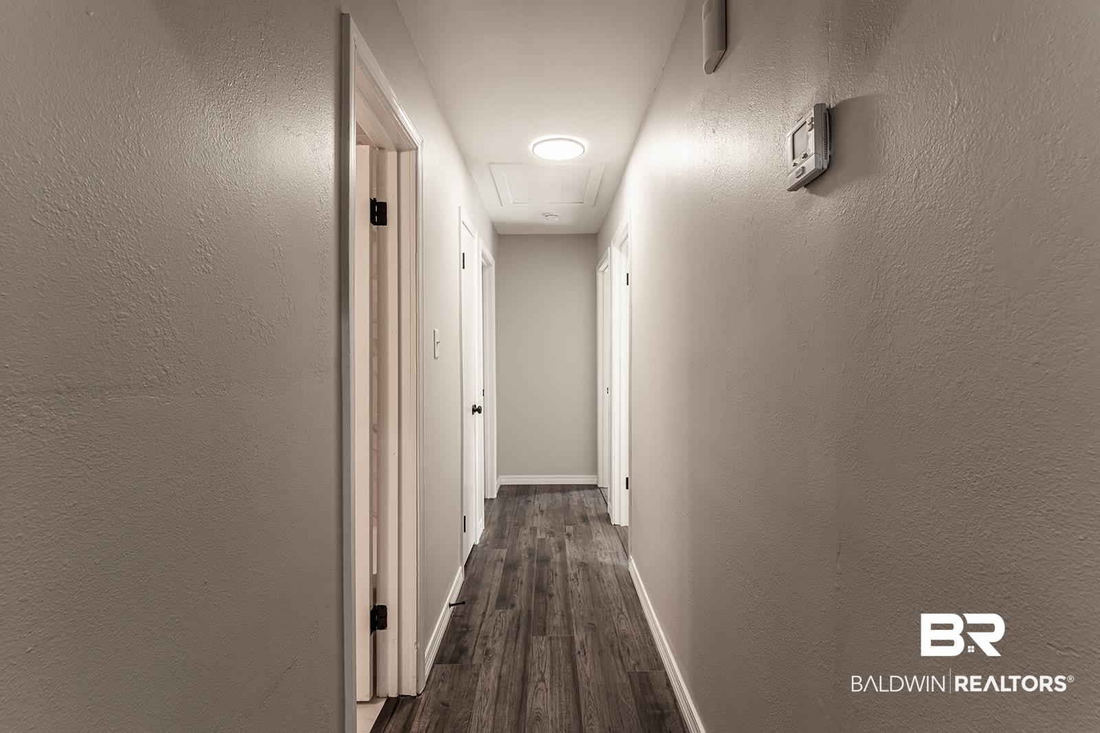 4626 Gold Drive Mobile, AL 36619 - Photo 20 of 48 Corridor with dark wood-type flooring