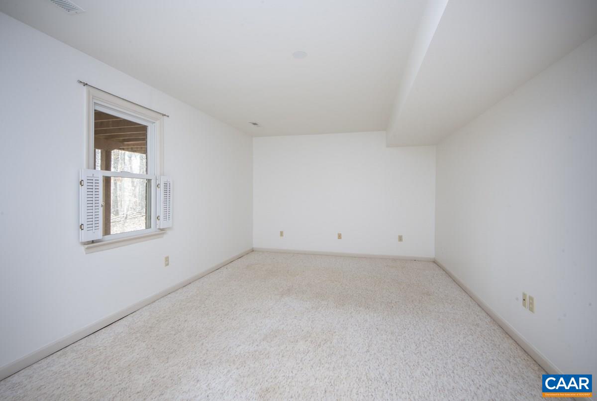 2455 Dunmore Road Charlottesville, VA 22901 - Photo 26 of 50 an empty room with windows