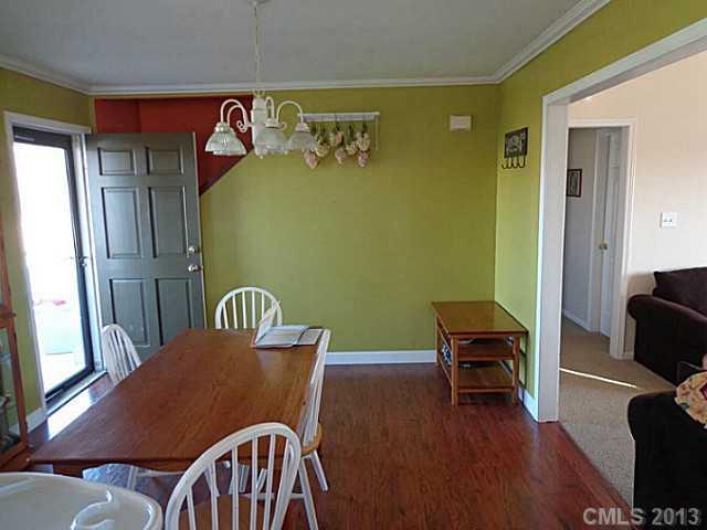 4102 Watson Church Road Monroe, NC 28110 - Photo 7 of 10 a view of a dining room with furniture window and wooden floor