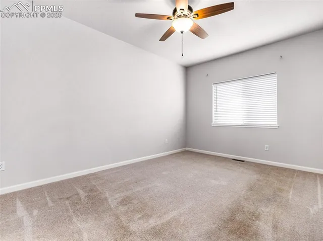 a view of small space with racks on the wall