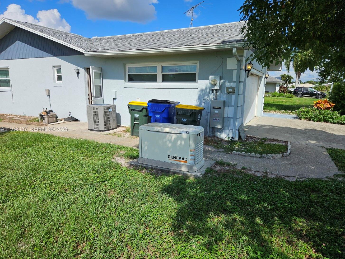 126 Citrus Road Northeast Lake Placid, FL 33852 - Photo 14 of 25 a view of a house with backyard and furniture