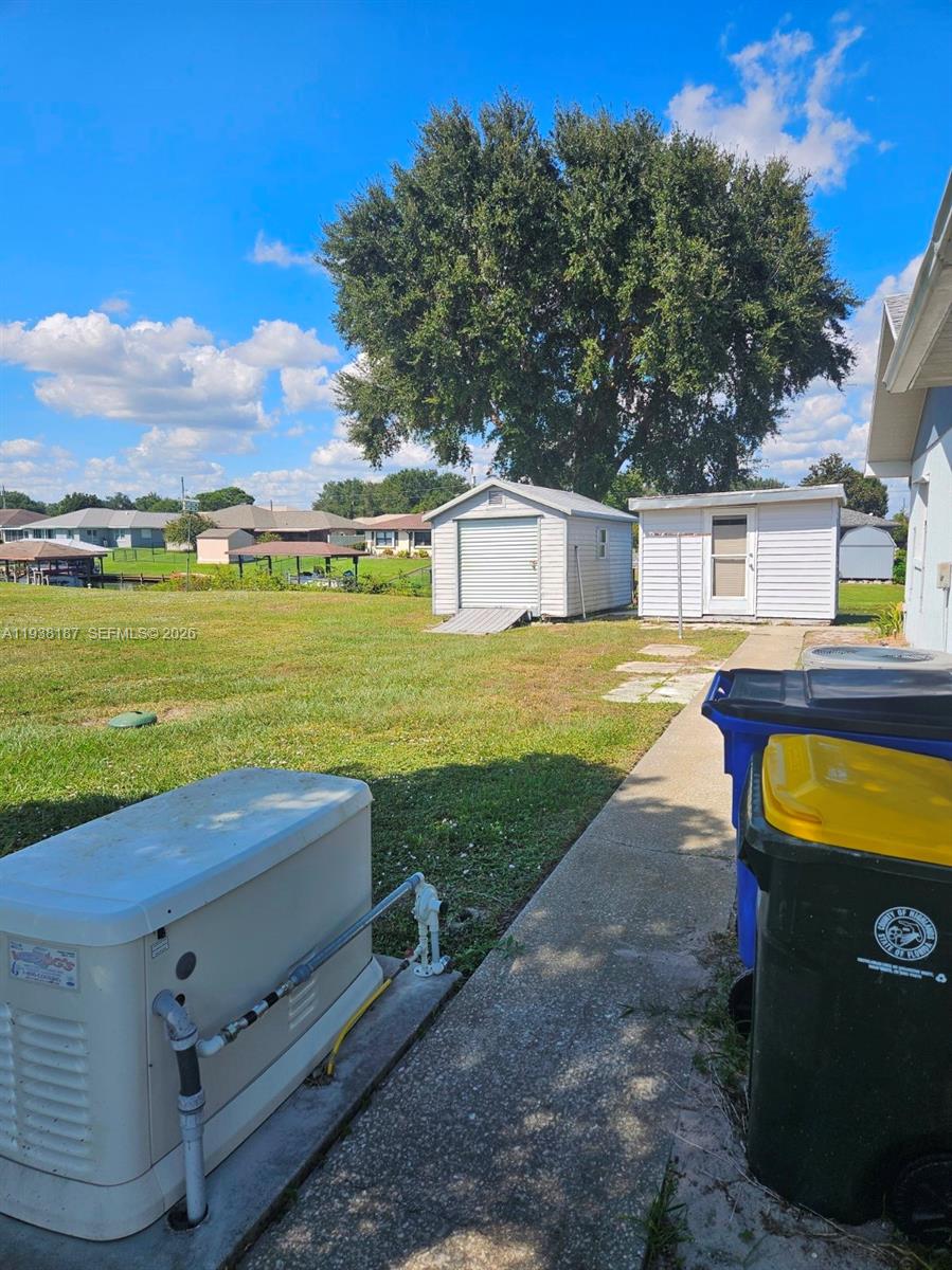 126 Citrus Road Northeast Lake Placid, FL 33852 - Photo 18 of 25 a view of a house with a ocean view