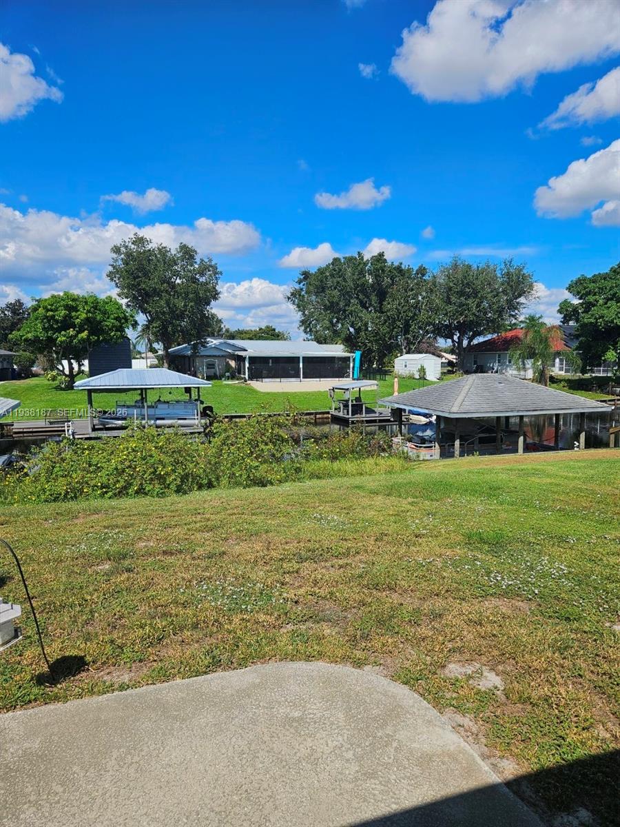 126 Citrus Road Northeast Lake Placid, FL 33852 - Photo 24 of 25 a view of an outdoor space and yard