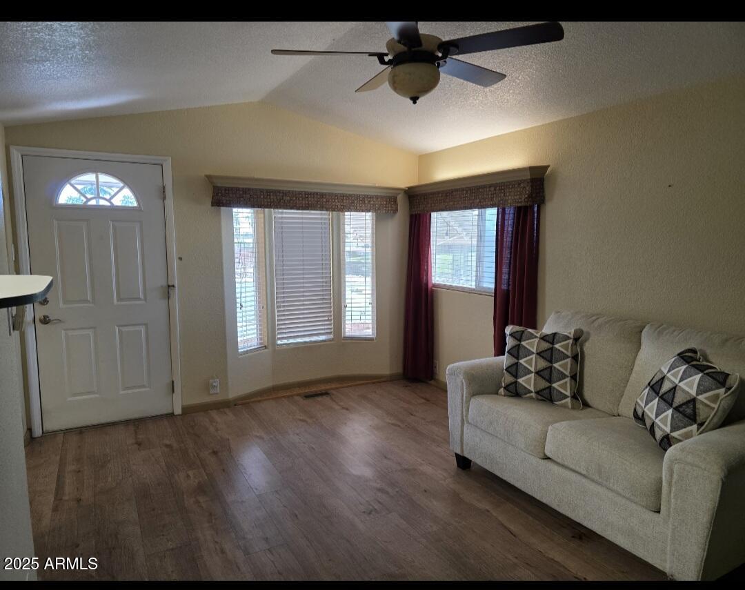 2359 East Pima Avenue Apache Junction, AZ 85119 - Photo 5 of 24 a living room with furniture and a window