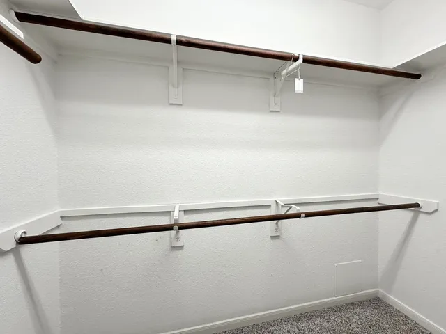 a view of a backyard of the house