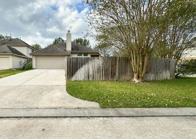 a view of backyard with green space
