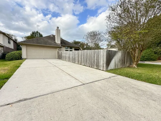 a view of a backyard with a garden