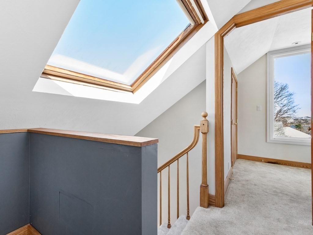 16 Putnam Road Somerville, MA 02145 - Photo 9 of 23 a view of a hallway with staircase
