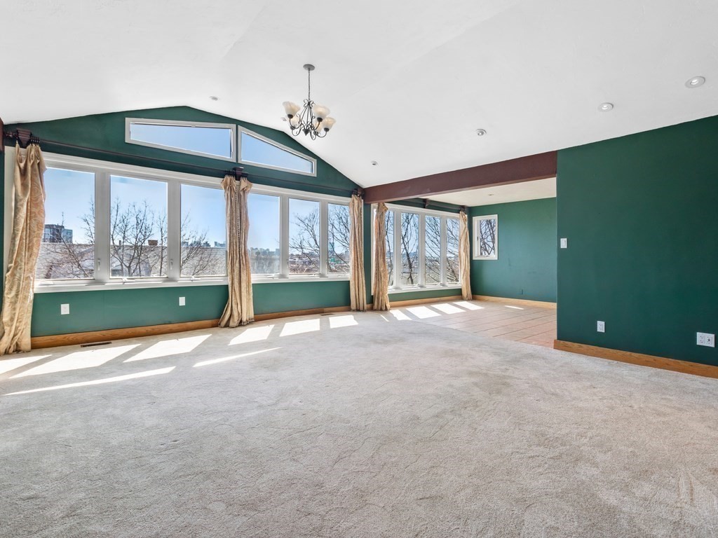 16 Putnam Road Somerville, MA 02145 - Photo 10 of 23 a view of an empty room with a window