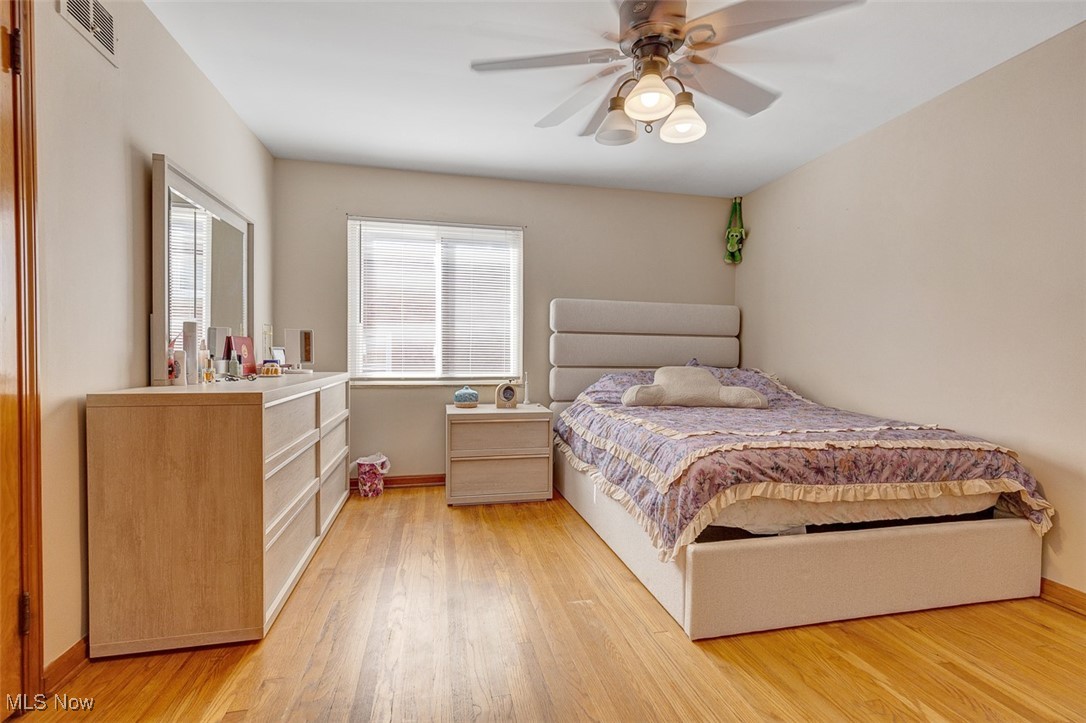 6136 Ridge Road Cleveland, OH 44129 - Photo 26 of 40 Bedroom with light wood finished floors and a ceiling fan