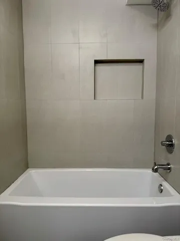 a bathroom with a bathtub