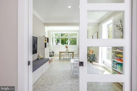 a view of a patio with couches chairs and a fire pit
