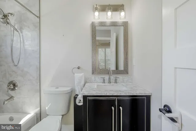 a view of hallway with washer and dryer
