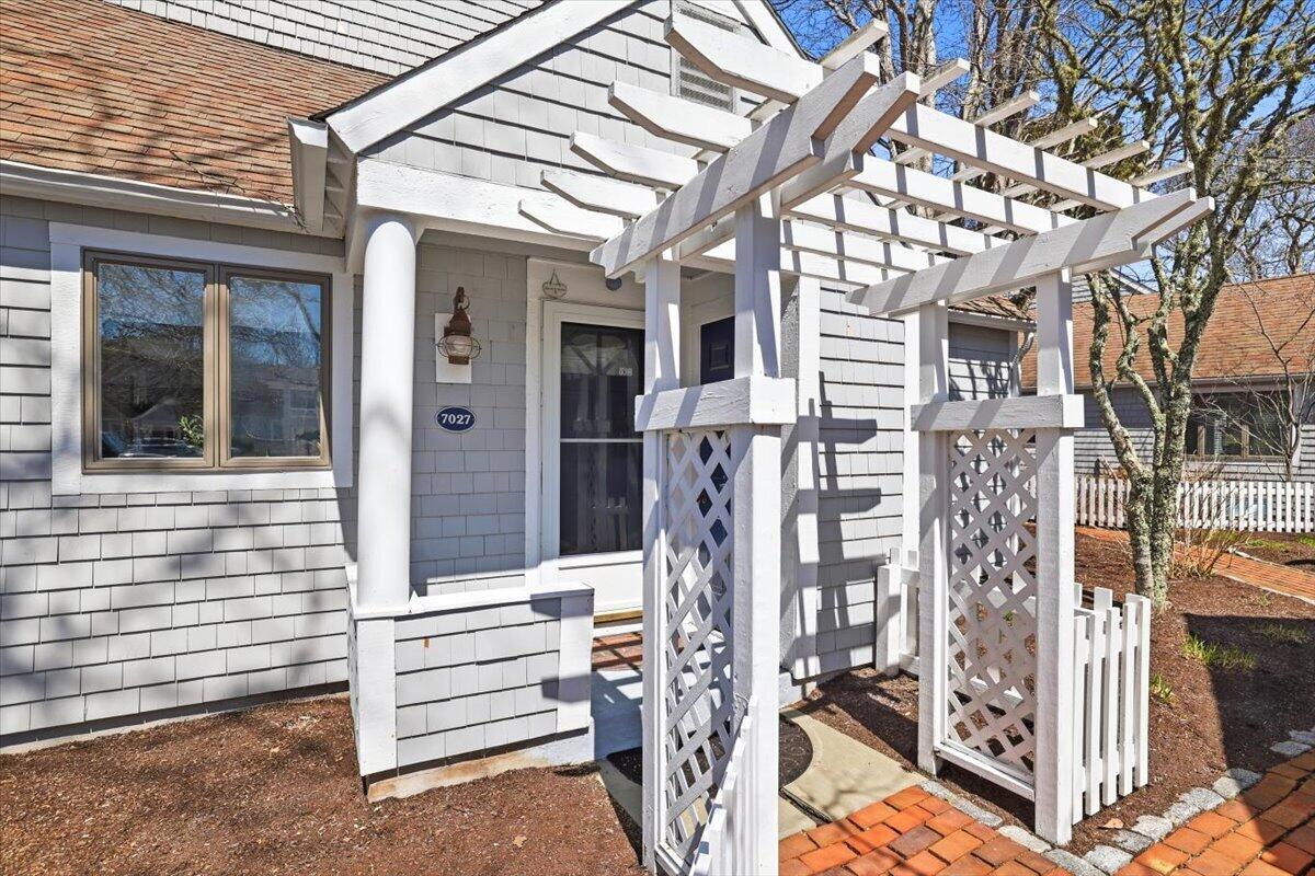100 Mid-Iron Way, Unit 7027 Mashpee, MA 02649 - Photo 3 of 38 a view of front door of house