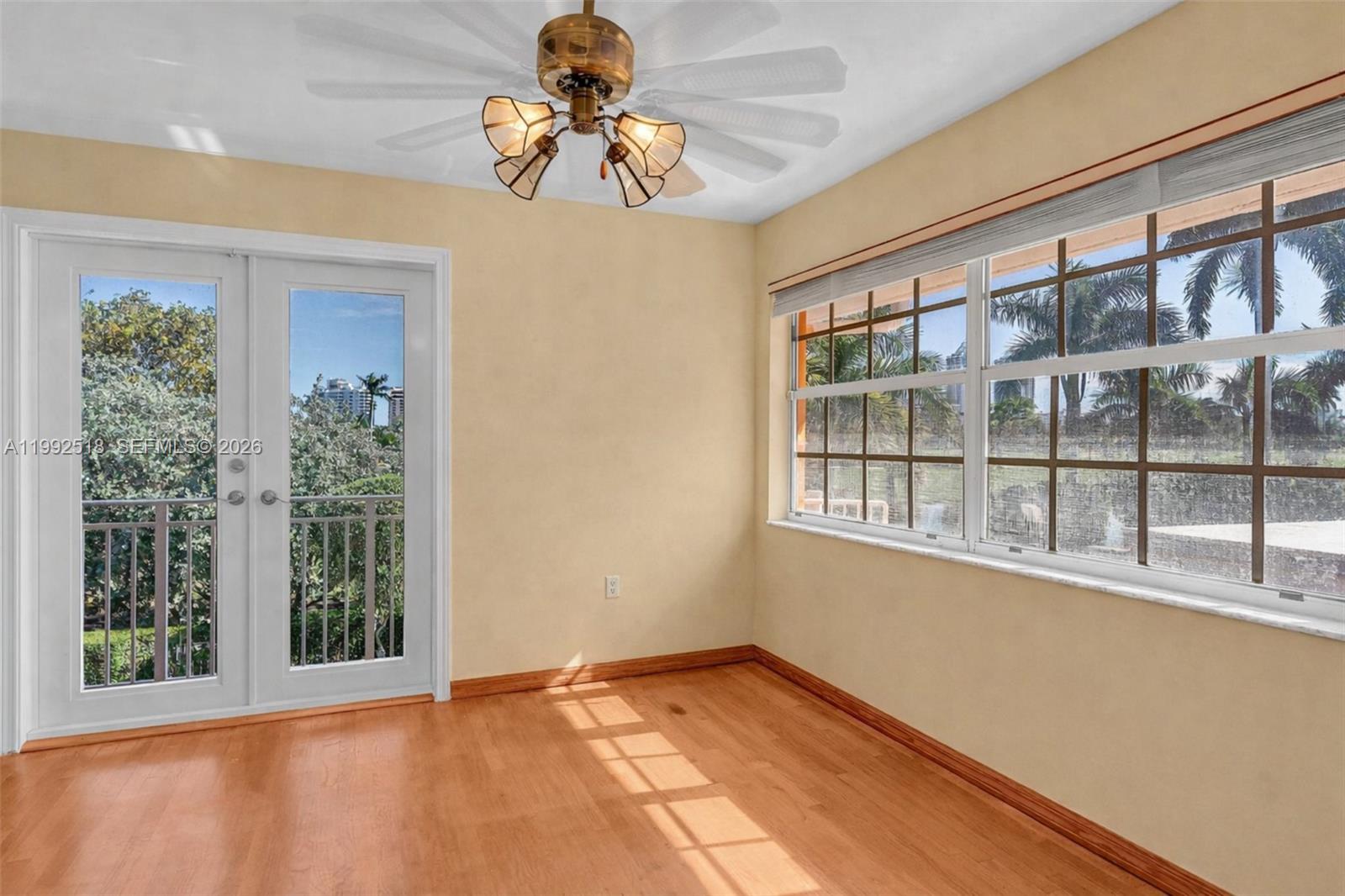 5309 Alton Road Miami Beach, FL 33140 - Photo 17 of 51 a view of an empty room with a window