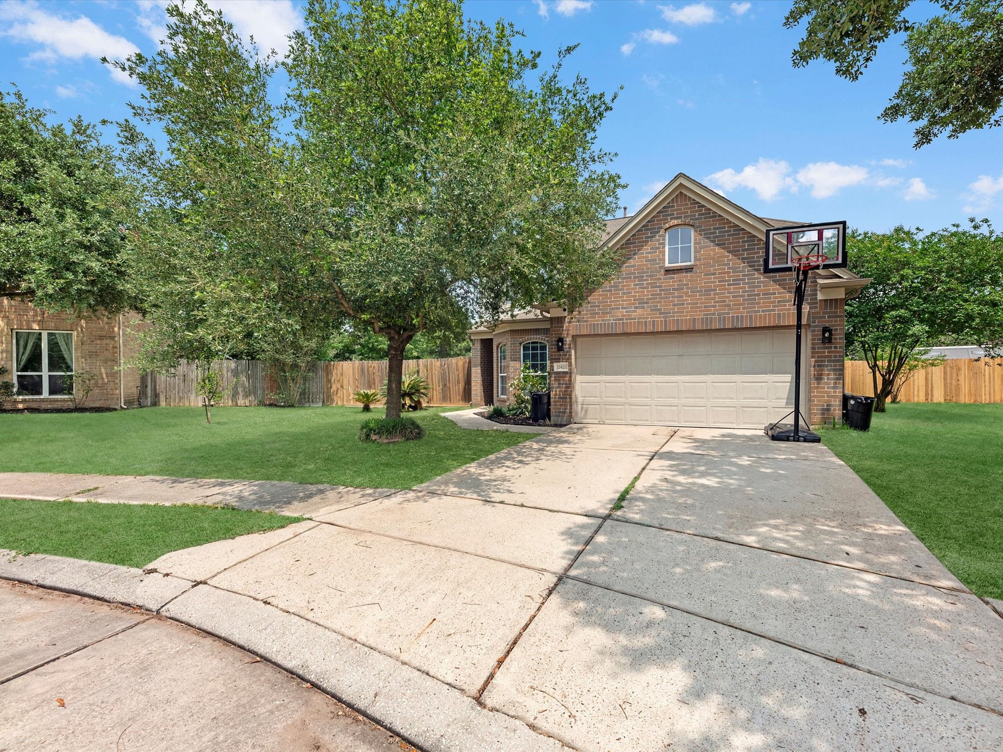 22422 Lamaster Lane Spring, TX 77373 - Photo 3 of 35 Spacious driveway and low maintenance landscaping