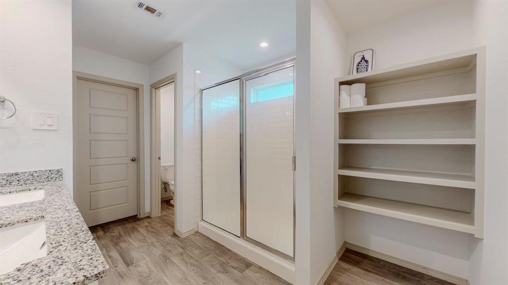6710 Riplee Street Beaumont, TX 77708 - Photo 16 of 27 a view of walk in closet with empty racks