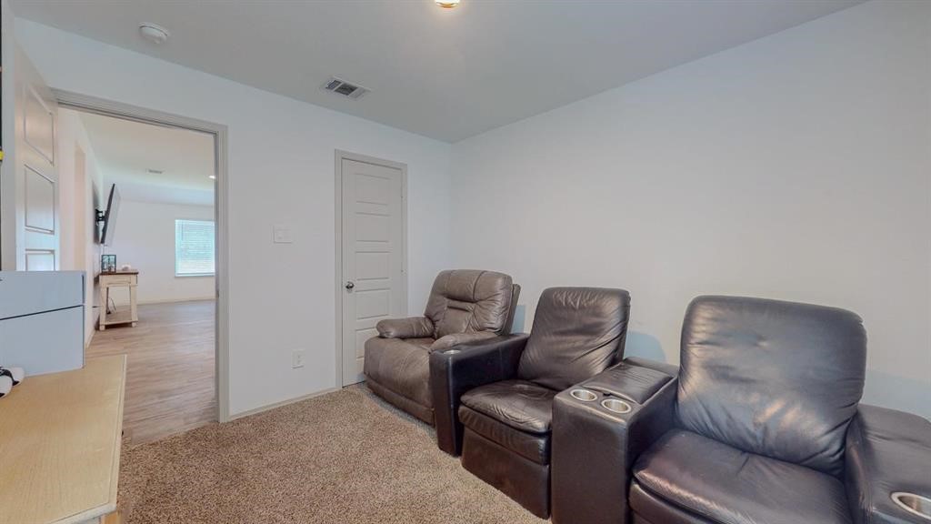 6710 Riplee Street Beaumont, TX 77708 - Photo 23 of 27 a living room with furniture