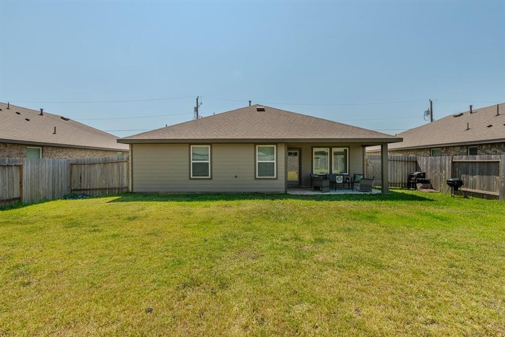 6710 Riplee Street Beaumont, TX 77708 - Photo 25 of 27 a house with swimming pool in front of it