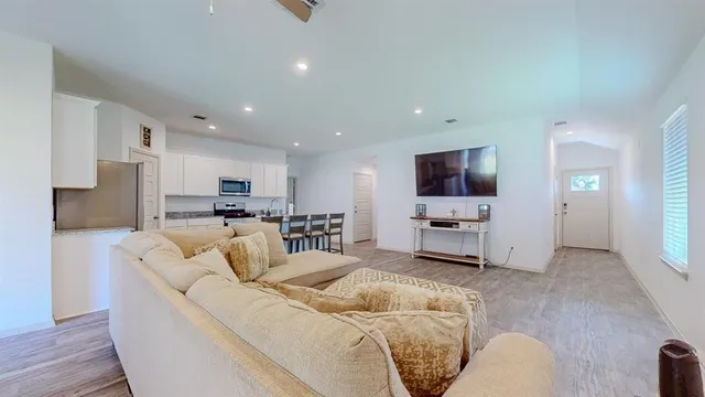 a living room with furniture and a couch