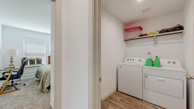 a utility room with dryer and washer