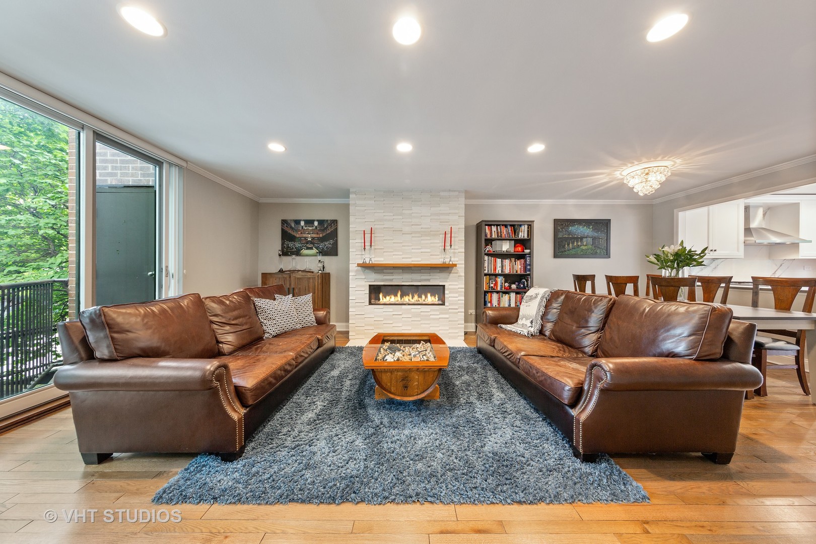 1308 North Sutton Place Chicago, IL 60610 - Photo 3 of 29 a living room with furniture and a wooden floor