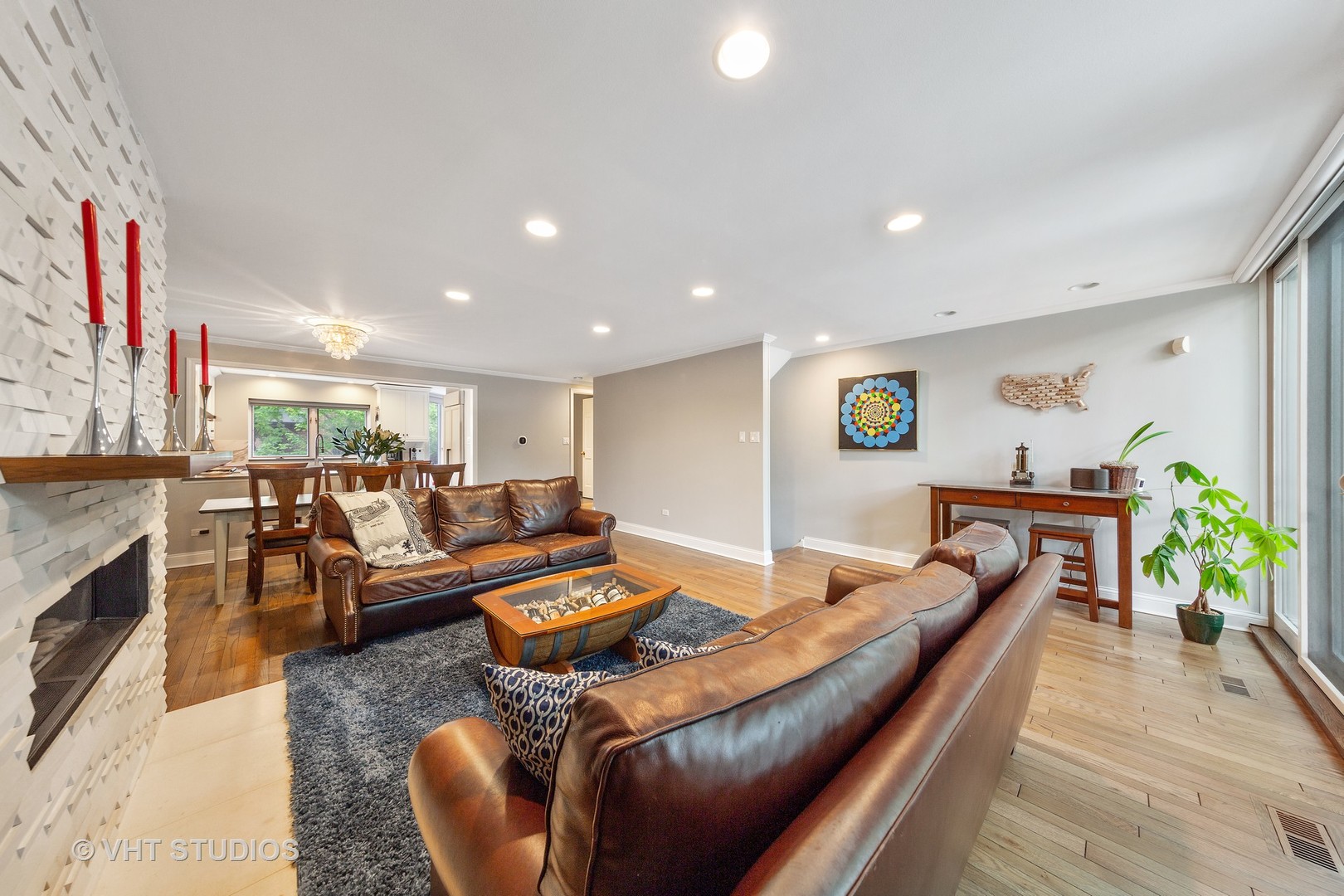 1308 North Sutton Place Chicago, IL 60610 - Photo 5 of 29 a living room with furniture and a fireplace