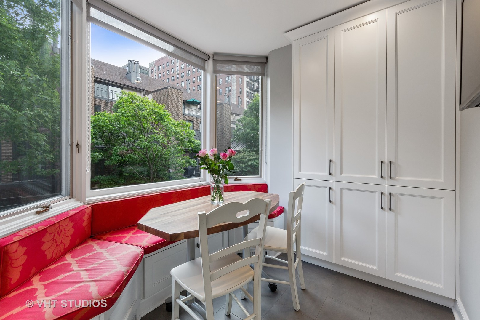 1308 North Sutton Place Chicago, IL 60610 - Photo 7 of 29 a view of a dining room with furniture window and outside view