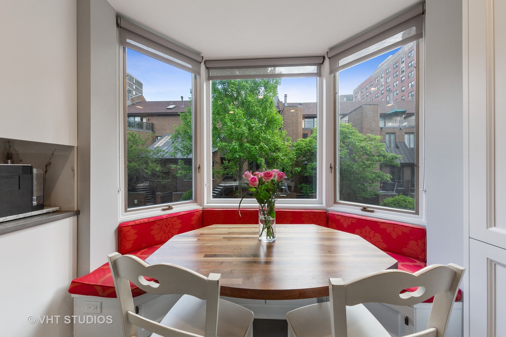1308 North Sutton Place Chicago, IL 60610 - Photo 8 of 29 a view of a dining room with furniture window and outside view