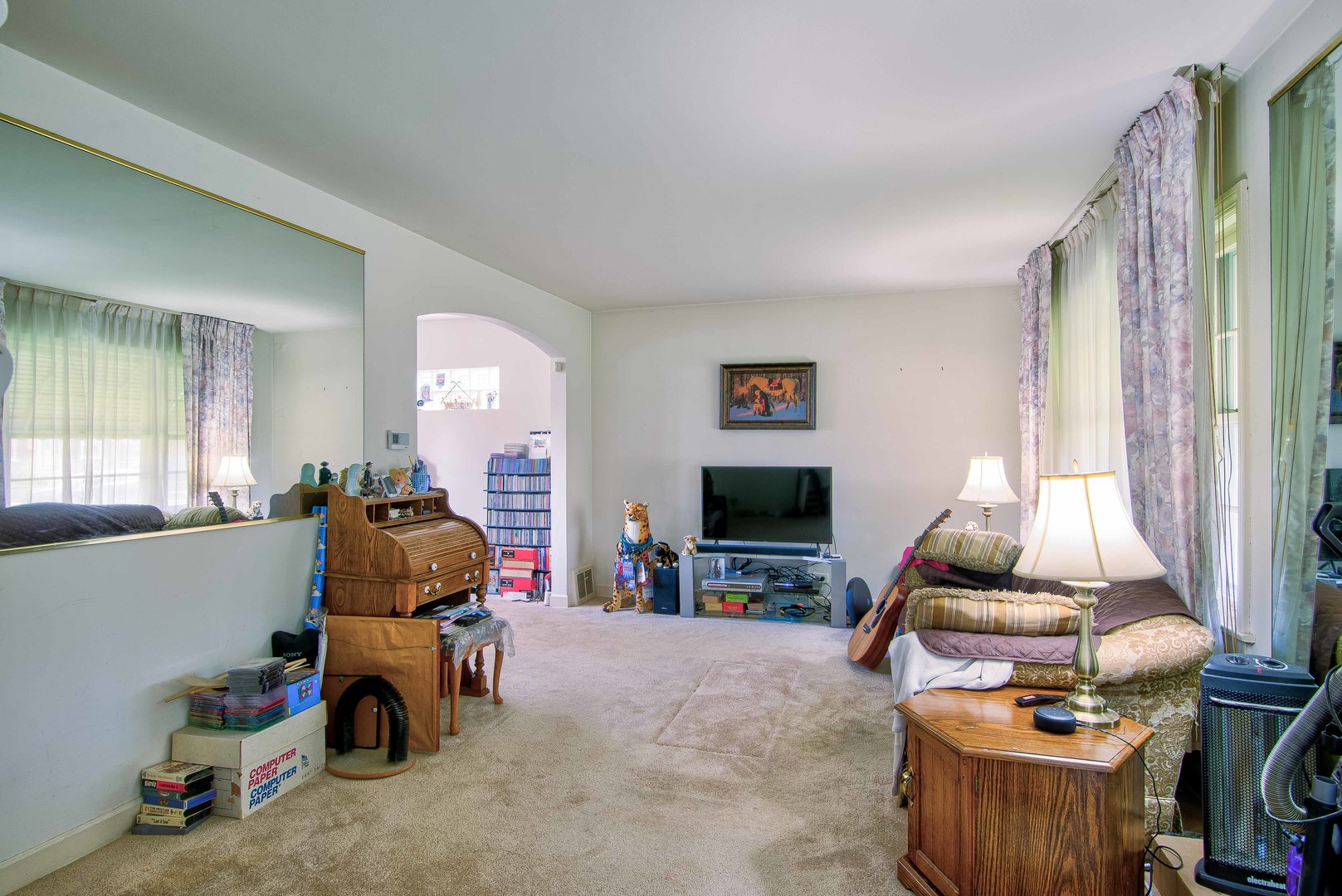 2441 Clarke Street River Grove, IL 60171 - Photo 2 of 25 a room with furniture and a flat screen tv