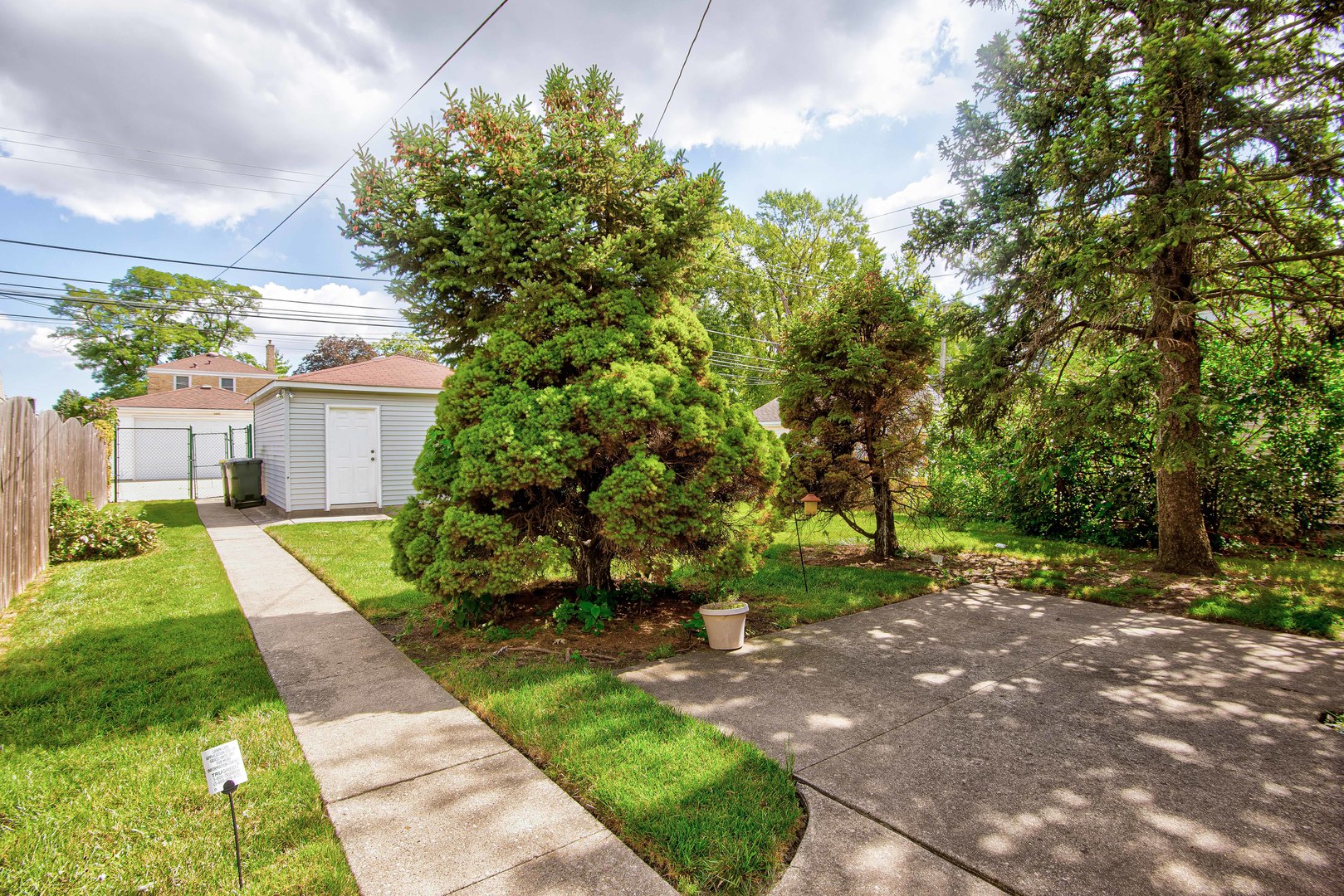 2441 Clarke Street River Grove, IL 60171 - Photo 22 of 25 a view of a house with a yard