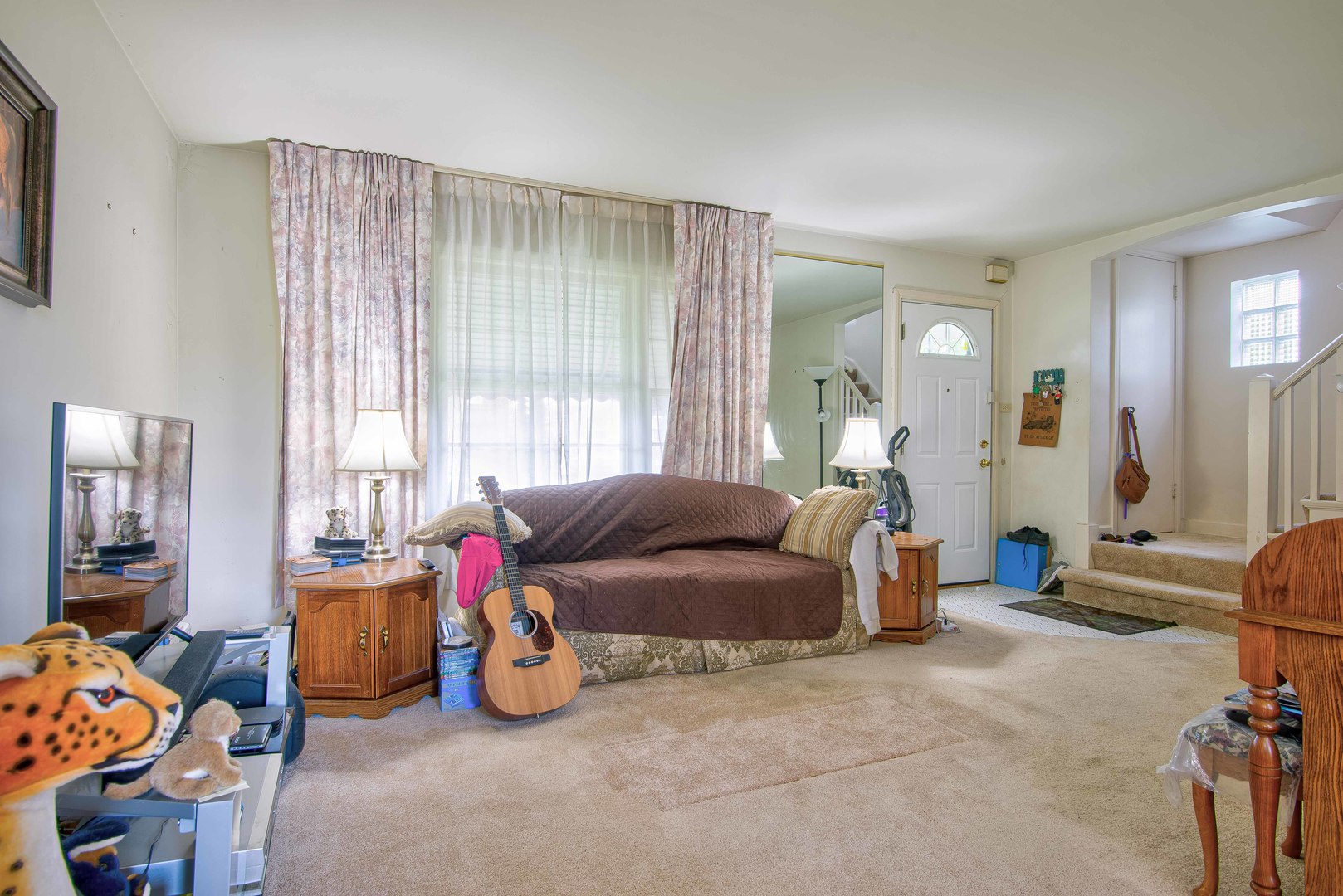 2441 Clarke Street River Grove, IL 60171 - Photo 3 of 25 a living room with furniture and a window