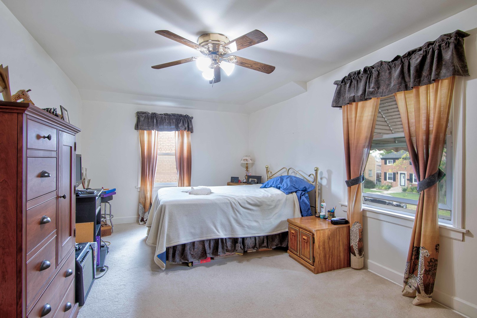 2441 Clarke Street River Grove, IL 60171 - Photo 9 of 25 a bed room with a bed and a window