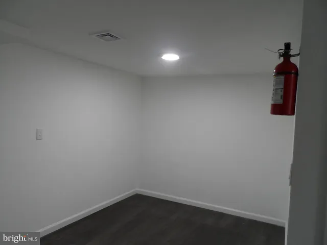 a view of small space with wooden floor