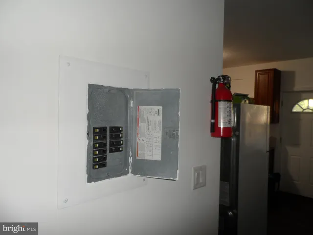 a view of an ocean with a palm tree