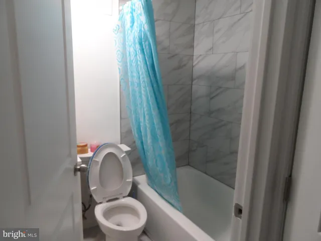 a front view of a house with garage