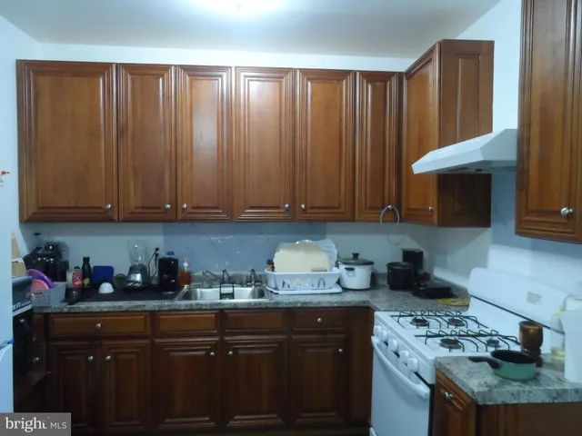 a bathroom with a sink and shower