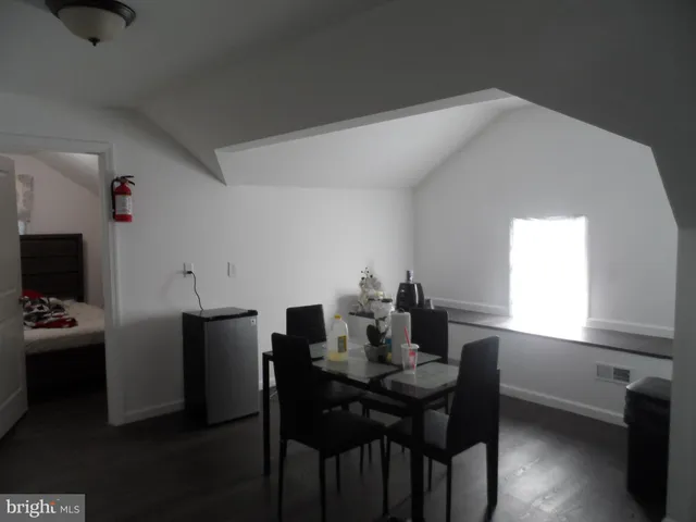 a view of a car in front of a house