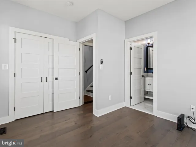wooden floor and closet in a room