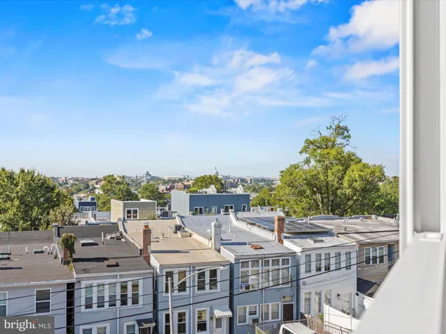 a view of a city that has tall buildings