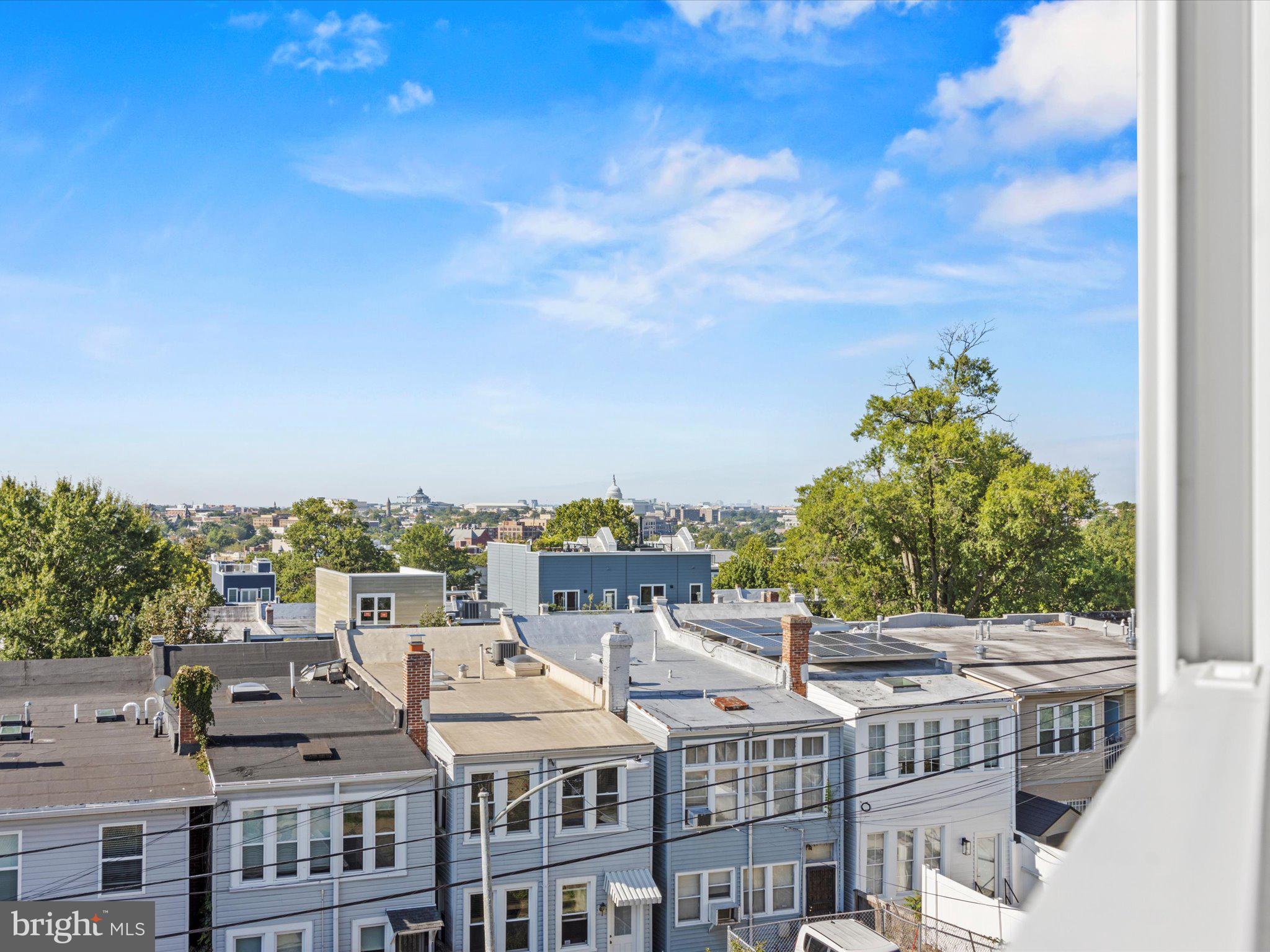 1267 Penn Street Northeast, Unit B Washington, DC 20002 - Photo 18 of 18 a view of a city that has tall buildings