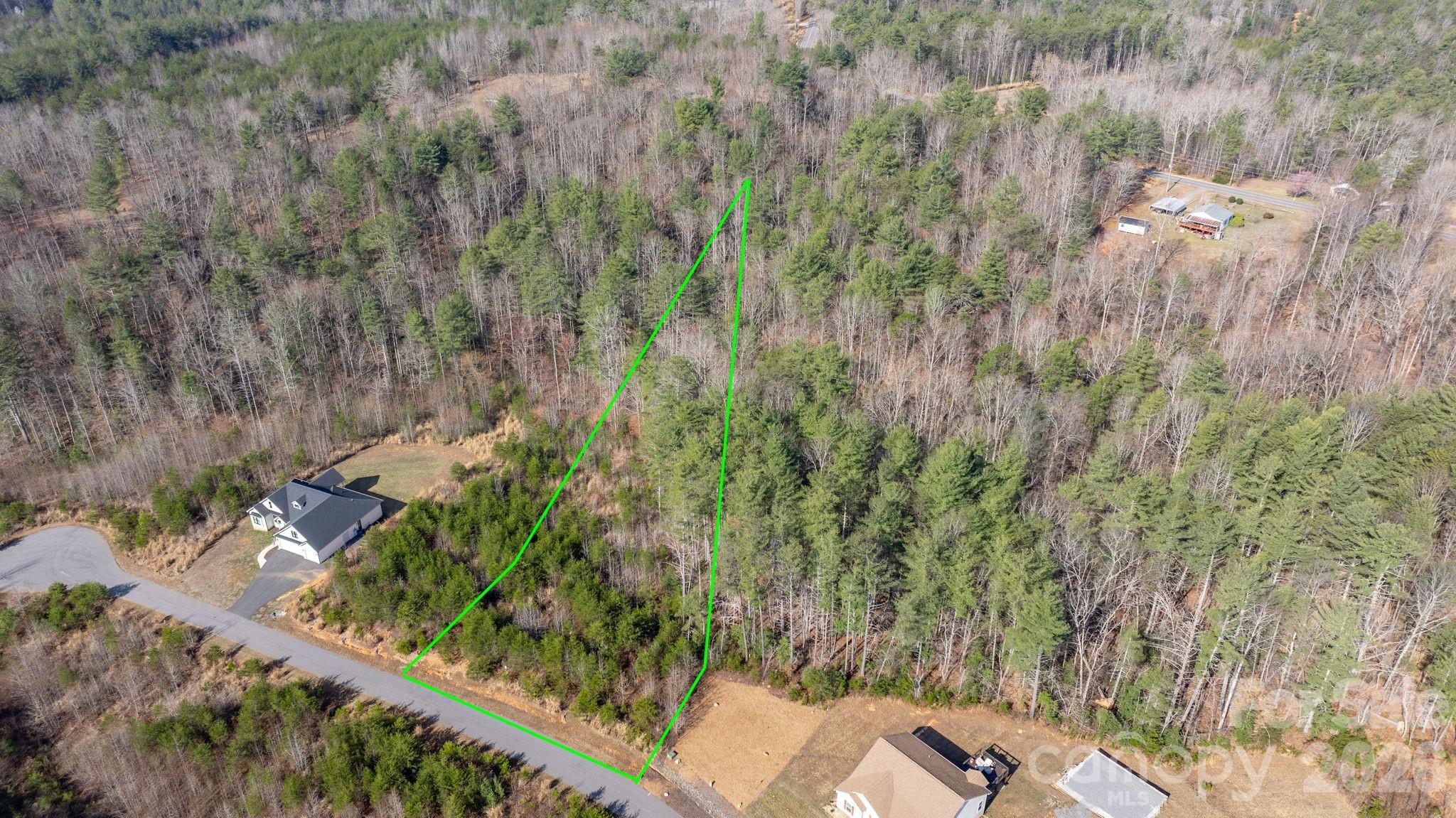 2084 Starlight Lane Morganton, NC 28655 - Photo 1 of 28 a view of a yard and basketball court