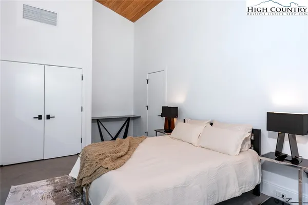 a bathroom with a shower and a sink